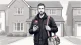 UK tradesperson on a residential job checking a new enquiry notification on their phone